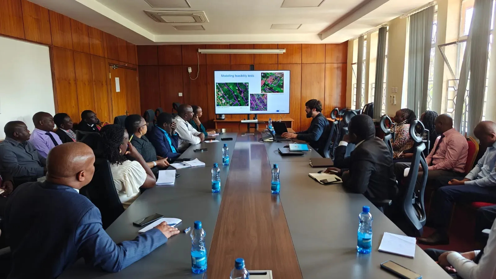 Scientists and officials working together on coffee mapping.